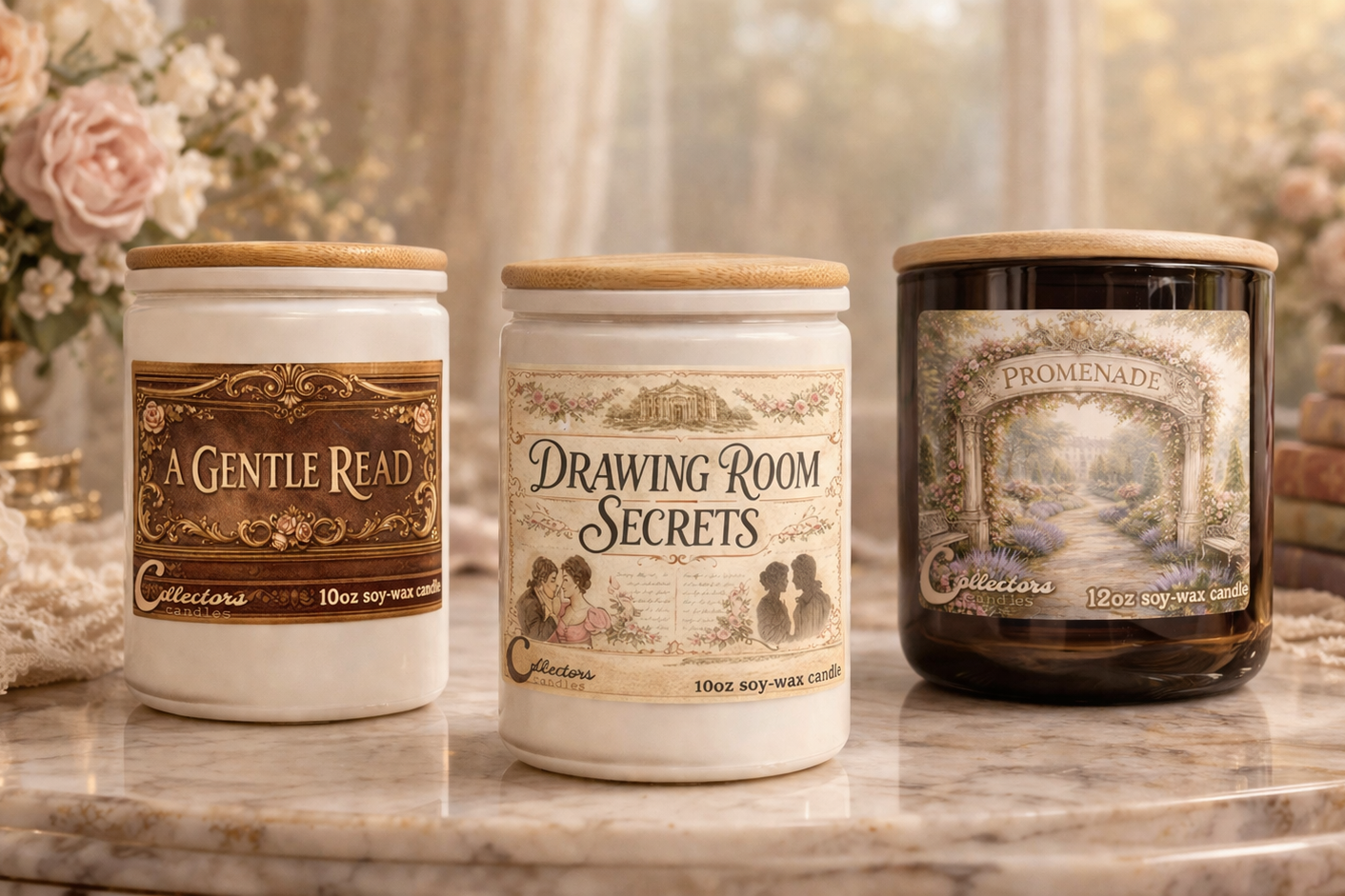 Three candles with labels on a marble surface, with flowers in the background